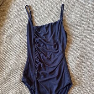 XS House of Harlow asymmetrical bodysuit from Revolve